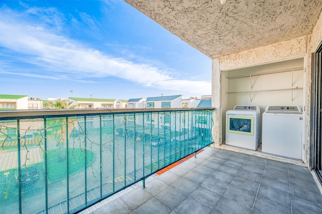 balcony with washer and dryer