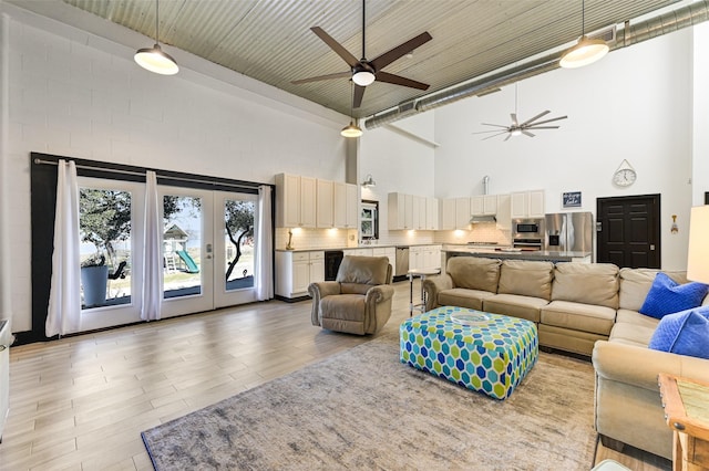 206 County Road 142, Burnet, TX 78611 - living area featuring a towering ceiling and ceiling fan