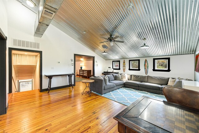 206 County Road 142, Burnet, TX 78611 - living room with ceiling fan, high vaulted ceiling, visible vents, and light wood-style floors