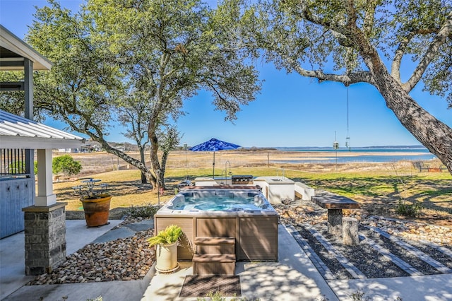 206 County Road 142, Burnet, TX 78611 - view of patio with fence and a hot tub
