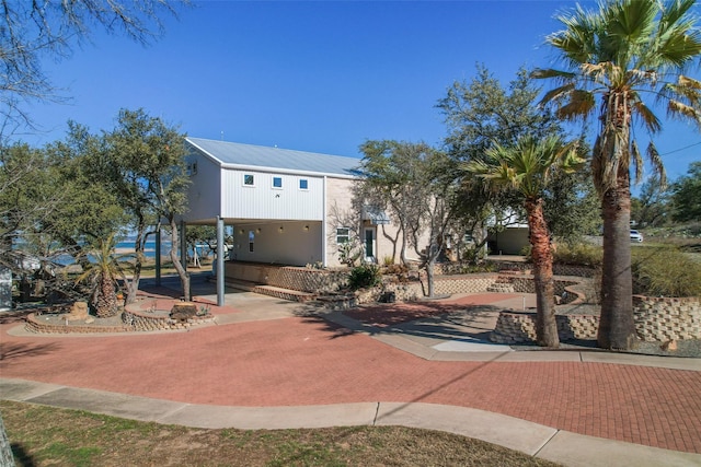 206 County Road 142, Burnet, TX 78611 - exterior space with a carport and decorative driveway