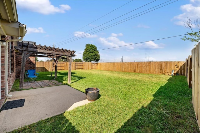 view of yard featuring a patio, a fenced backyard, and a pergola