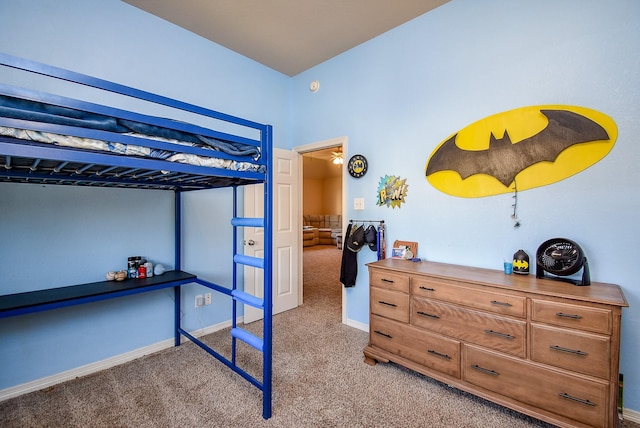 carpeted bedroom with baseboards