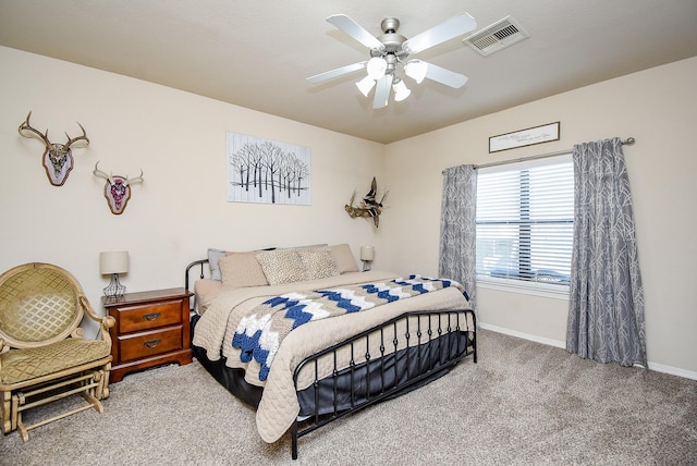 bedroom with a ceiling fan, carpet, visible vents, and baseboards