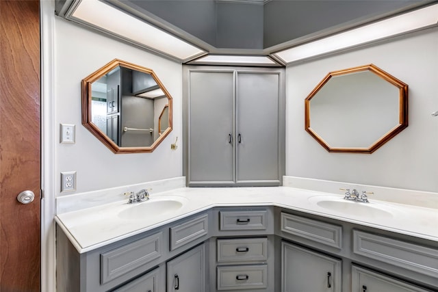 bathroom with double vanity and a sink