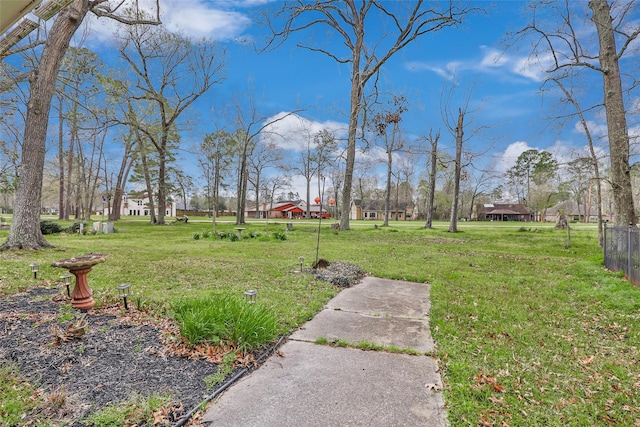 view of yard with fence