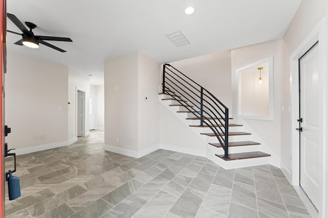 foyer with recessed lighting, stairway, baseboards, and a ceiling fan