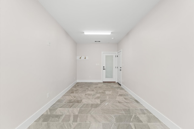 interior space featuring visible vents and baseboards