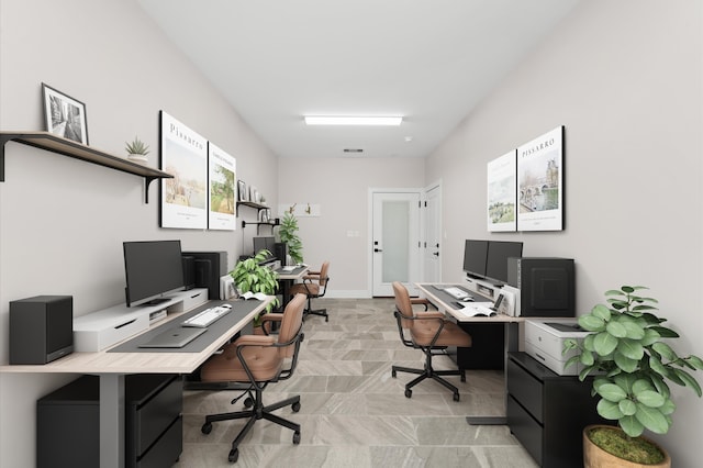 office with visible vents and baseboards