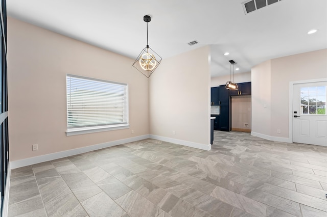 spare room with recessed lighting, visible vents, and baseboards