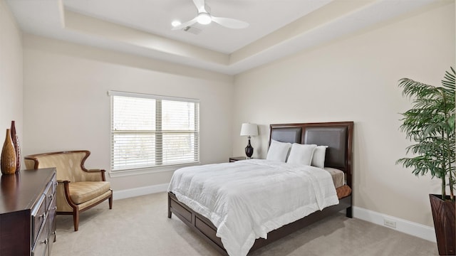 44 Tall Trl, Missouri City, TX 77459 - bedroom featuring a raised ceiling, baseboards, visible vents, and light colored carpet