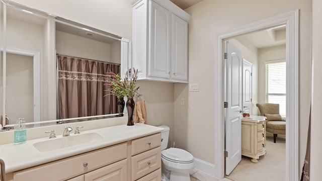 44 Tall Trl, Missouri City, TX 77459 - bathroom featuring baseboards, vanity, and toilet