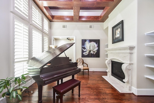 44 Tall Trl, Missouri City, TX 77459 - living area with coffered ceiling, beamed ceiling, visible vents, and a premium fireplace