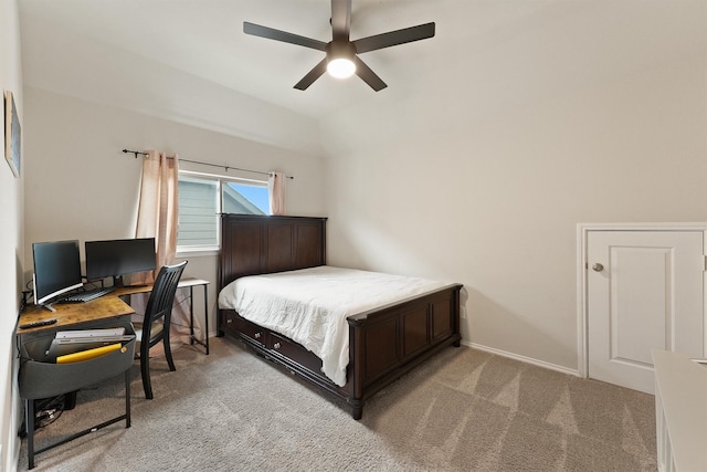 carpeted bedroom with ceiling fan, lofted ceiling, and baseboards