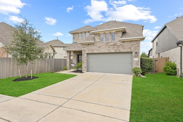 view of front of house featuring brick siding, fence, and a front lawn