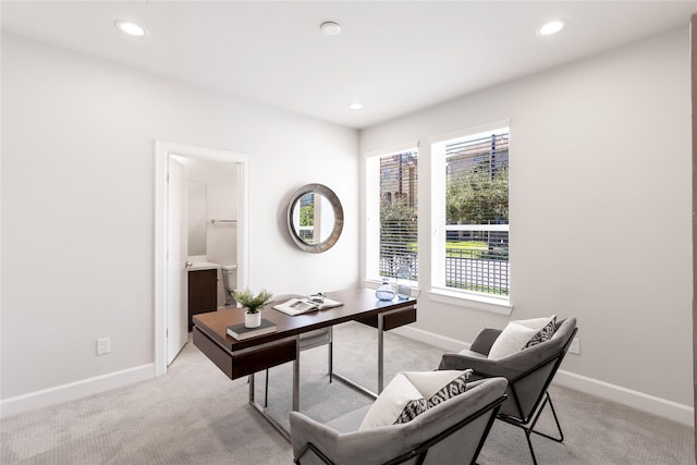 home office featuring baseboards, recessed lighting, and light colored carpet