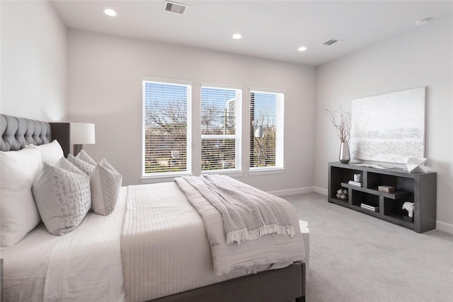 bedroom with light carpet, baseboards, visible vents, and recessed lighting