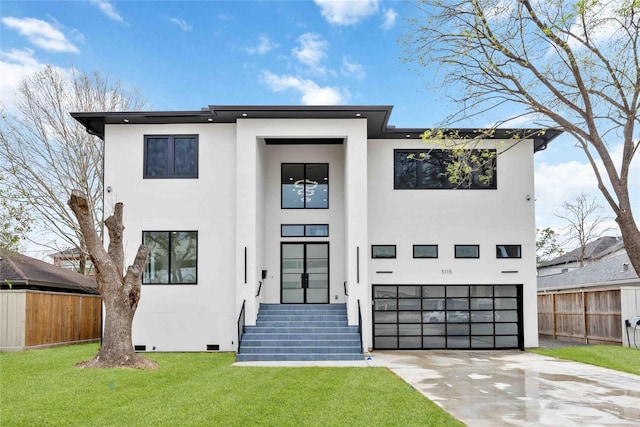 contemporary house featuring driveway, crawl space, fence, a front lawn, and stucco siding