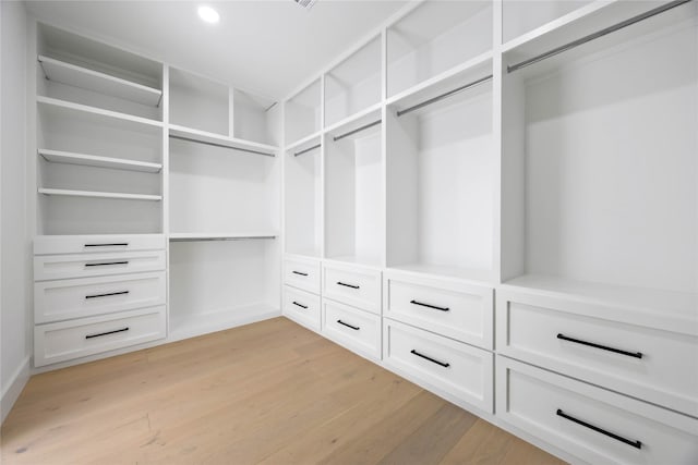 walk in closet featuring light wood-type flooring