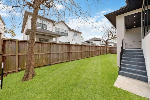 view of yard featuring a fenced backyard