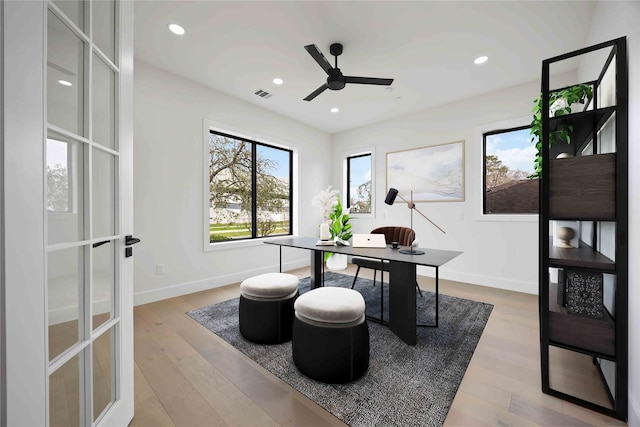 home office featuring french doors, wood finished floors, visible vents, and recessed lighting