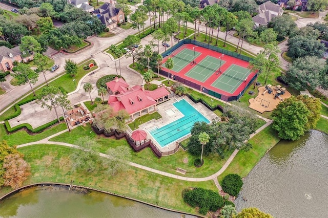 bird's eye view with a water view