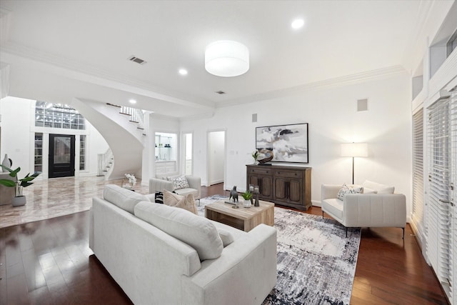 living room with stairway, visible vents, recessed lighting, dark wood-style flooring, and crown molding