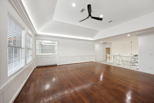 interior space featuring visible vents, ceiling fan, vaulted ceiling, and hardwood / wood-style flooring