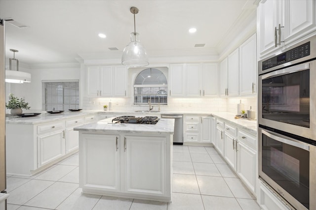 kitchen featuring light tile patterned floors, decorative backsplash, stainless steel appliances, and ornamental molding