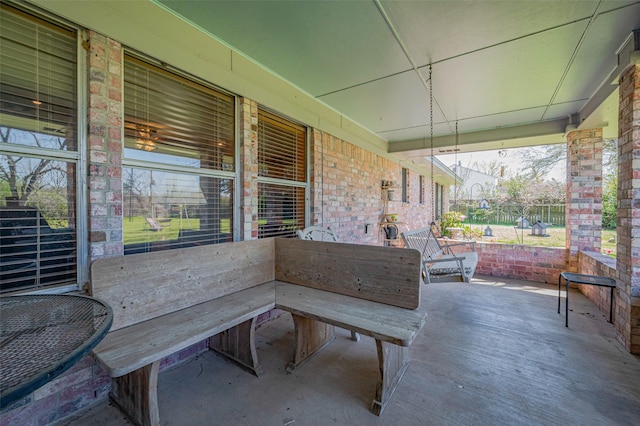 view of patio featuring an outbuilding