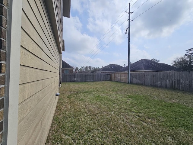 view of yard featuring a fenced backyard