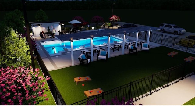 pool with a patio area and fence