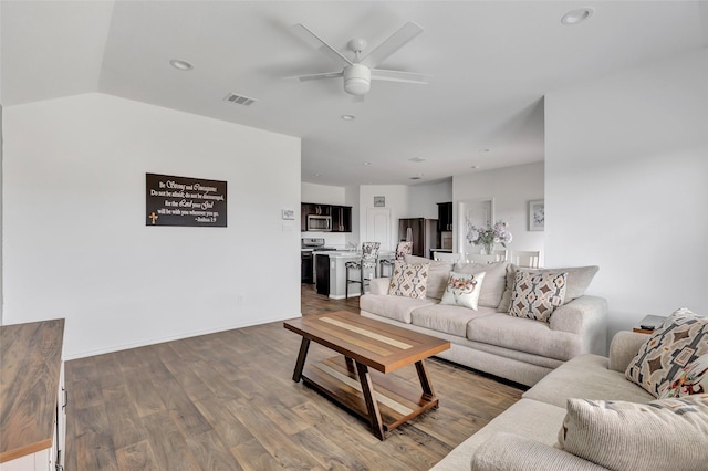 living room featuring visible vents, a ceiling fan, wood finished floors, recessed lighting, and baseboards