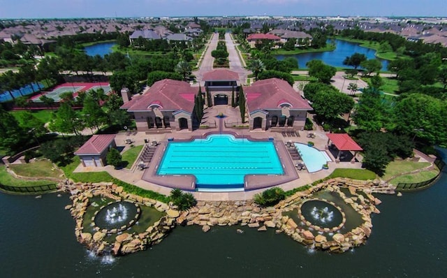 drone / aerial view featuring a water view