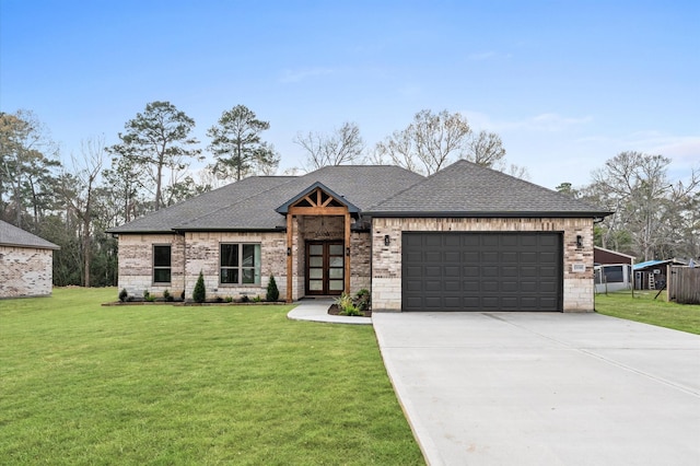 view of front of home with an attached garage, a shingled roof, brick siding, concrete driveway, and a front yard