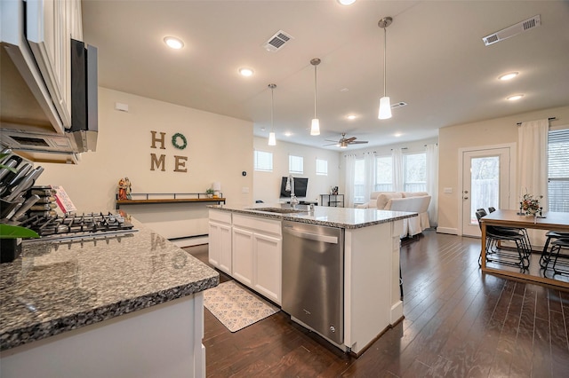 kitchen featuring dishwasher, dark wood finished floors, visible vents, and white cabinets