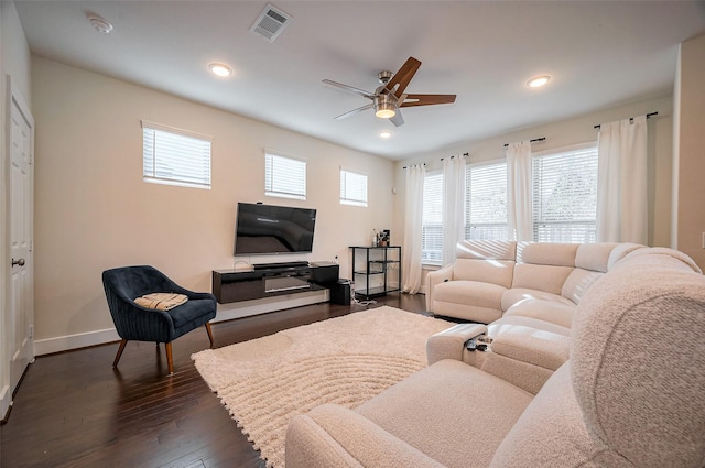 living room with dark wood-style flooring, recessed lighting, visible vents, a ceiling fan, and baseboards