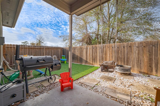 view of patio with a fenced backyard