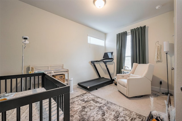 carpeted bedroom with baseboards