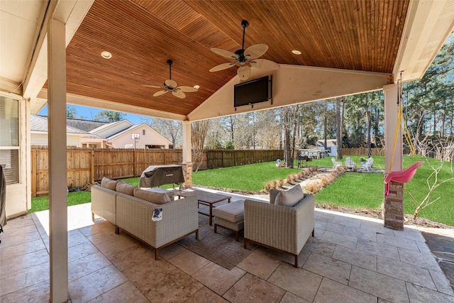 view of patio with ceiling fan, an outdoor hangout area, and a fenced backyard