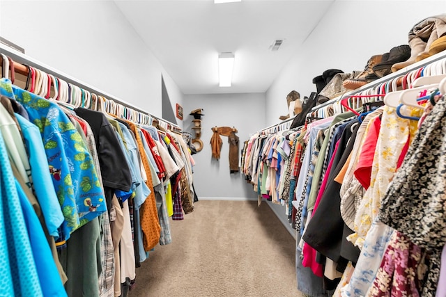 walk in closet with carpet flooring and visible vents