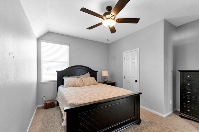 bedroom with light carpet, a ceiling fan, and baseboards