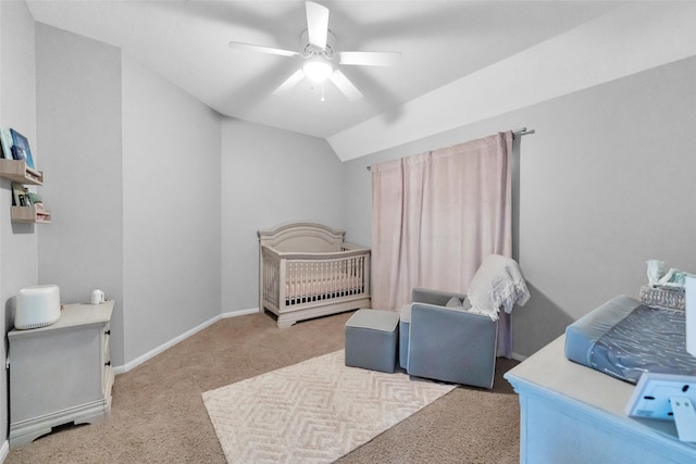 bedroom with carpet floors, baseboards, vaulted ceiling, and a ceiling fan