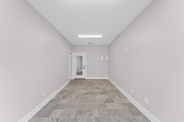 interior space featuring visible vents and baseboards