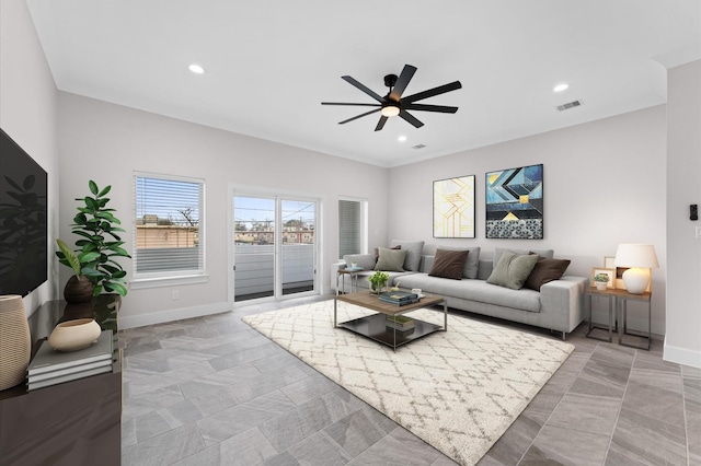 living area with visible vents, recessed lighting, a ceiling fan, and baseboards