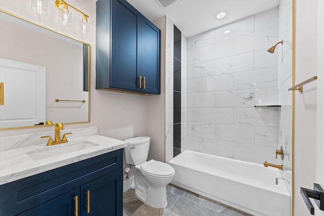 bathroom featuring recessed lighting, washtub / shower combination, toilet, and vanity