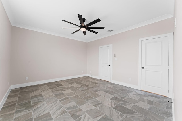 empty room with visible vents, baseboards, a ceiling fan, and crown molding