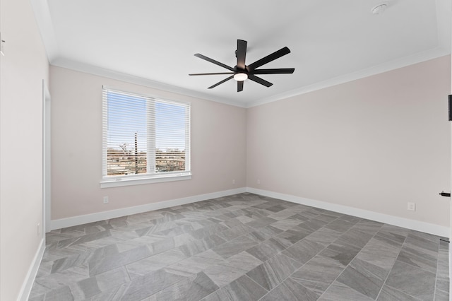 empty room with a ceiling fan, baseboards, and ornamental molding