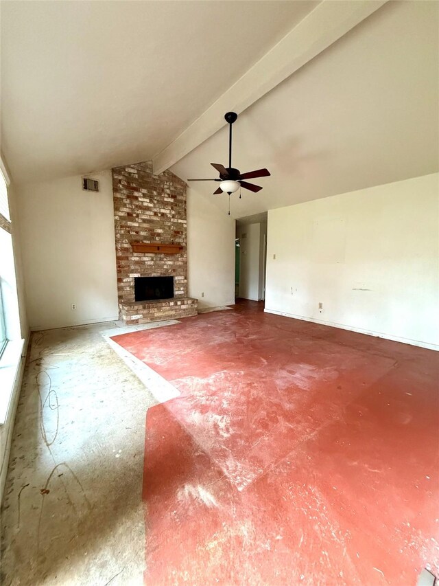 unfurnished living room with lofted ceiling with beams, ceiling fan, a fireplace, visible vents, and baseboards