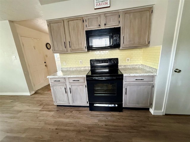 kitchen with black appliances, backsplash, dark wood finished floors, and baseboards